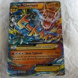 M charizard ex Pokémon. This card is NOT in perfect condition. Crease at bottom